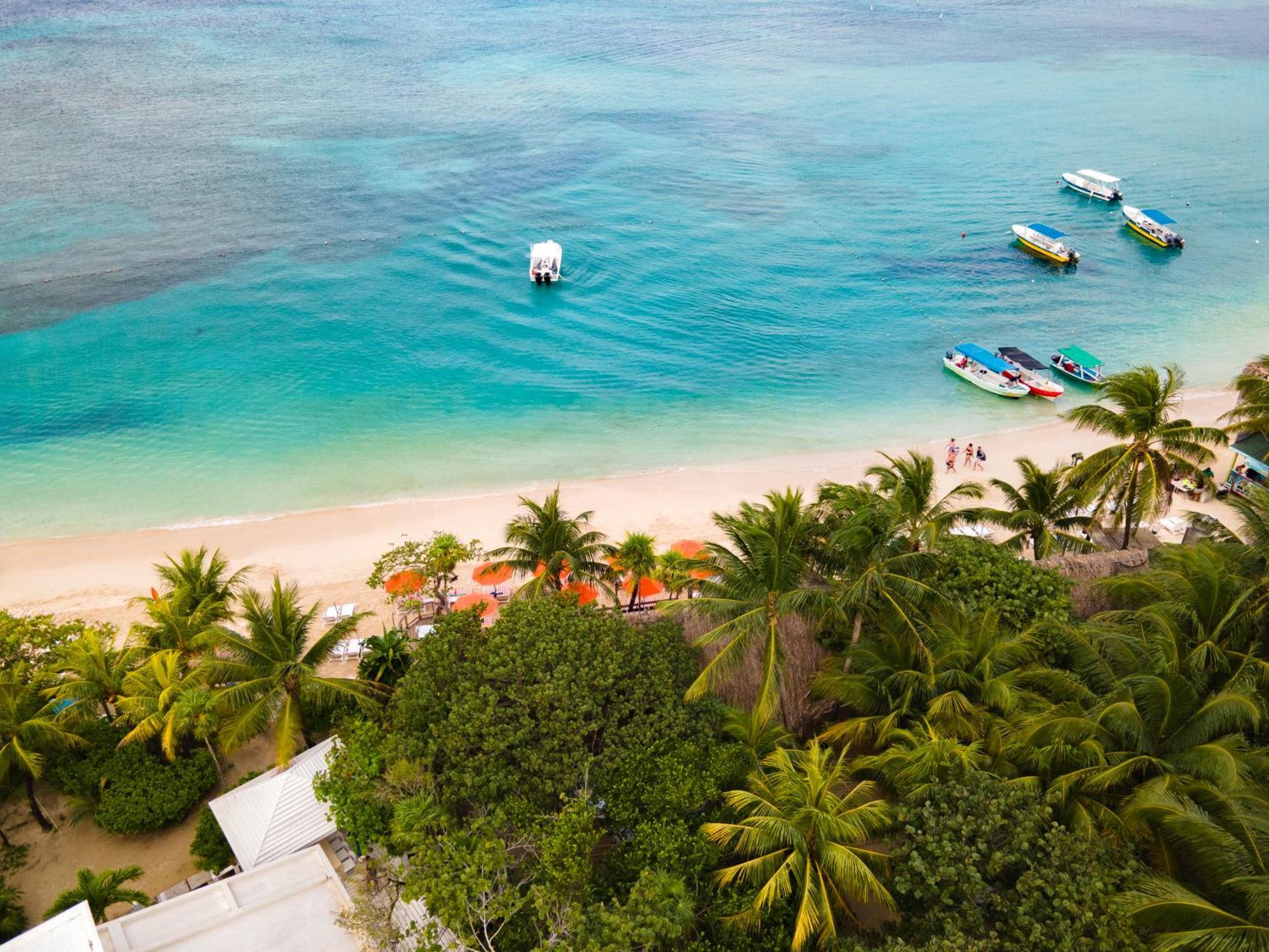 Paradise Beach Hotel & Resort West Bay Exterior foto