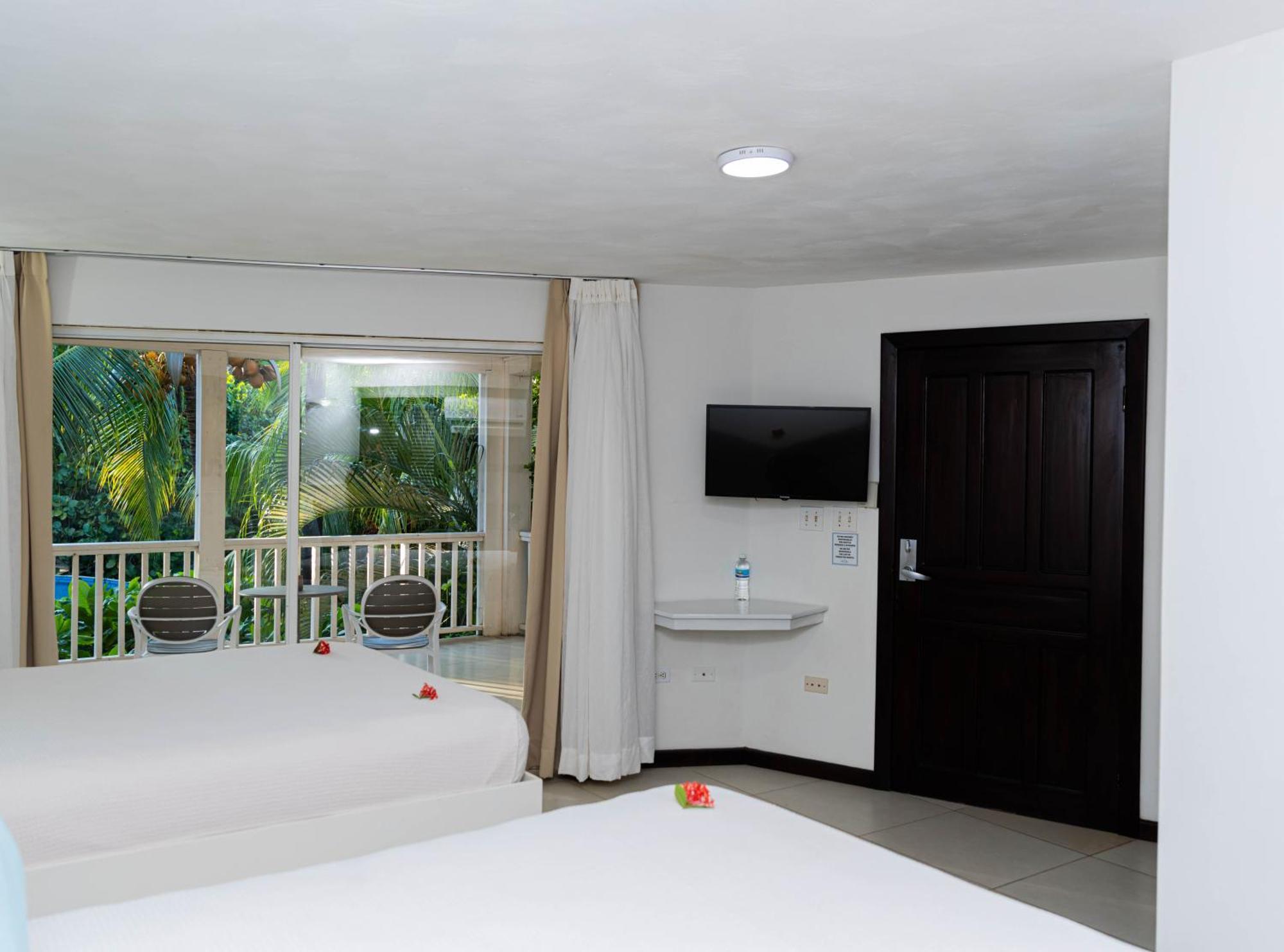 Paradise Beach Hotel & Resort West Bay Quarto foto