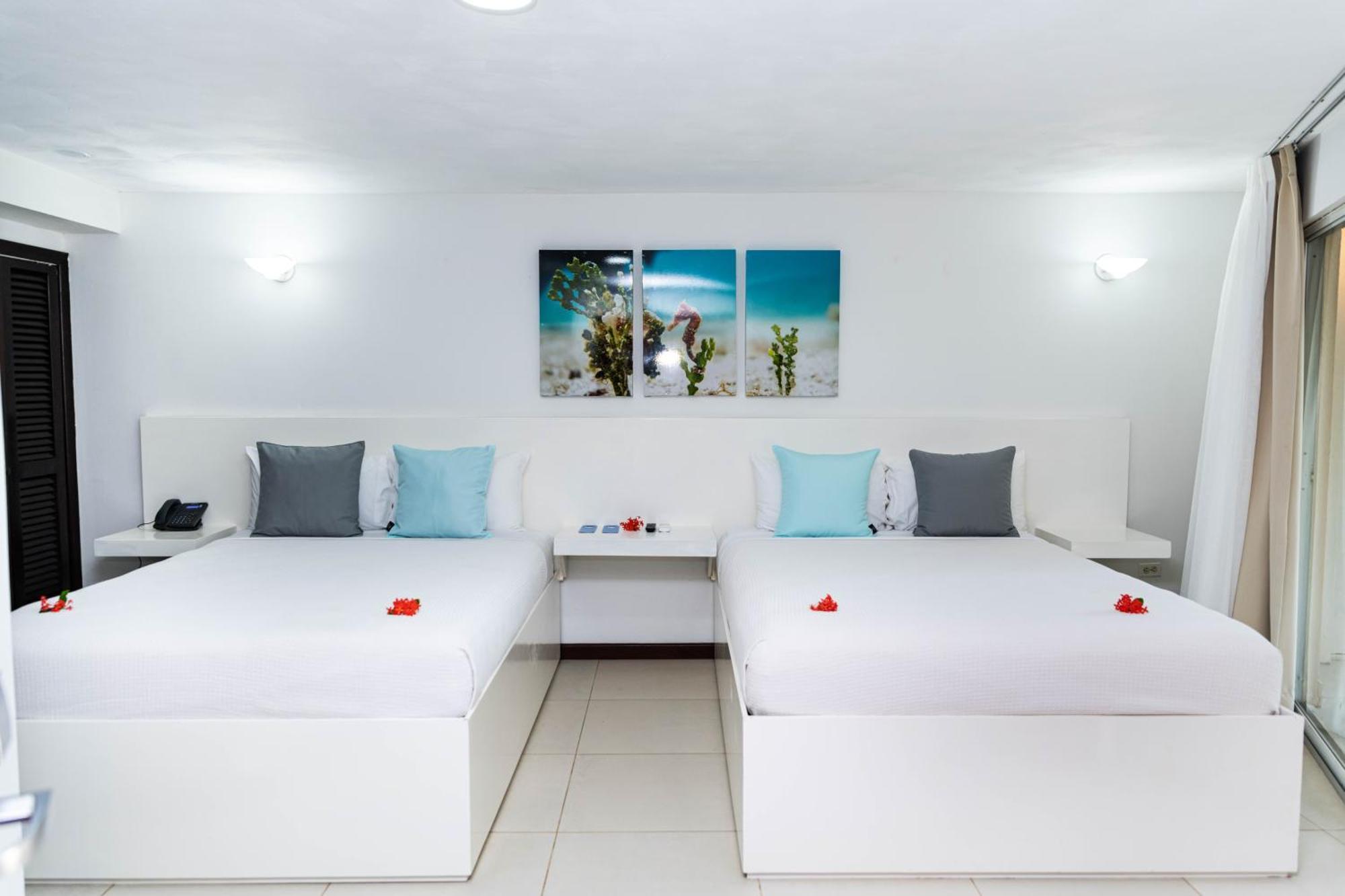 Paradise Beach Hotel & Resort West Bay Quarto foto